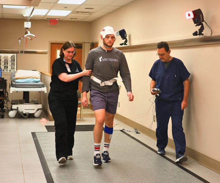 Patient and therapists in our Motion Analysis Lab