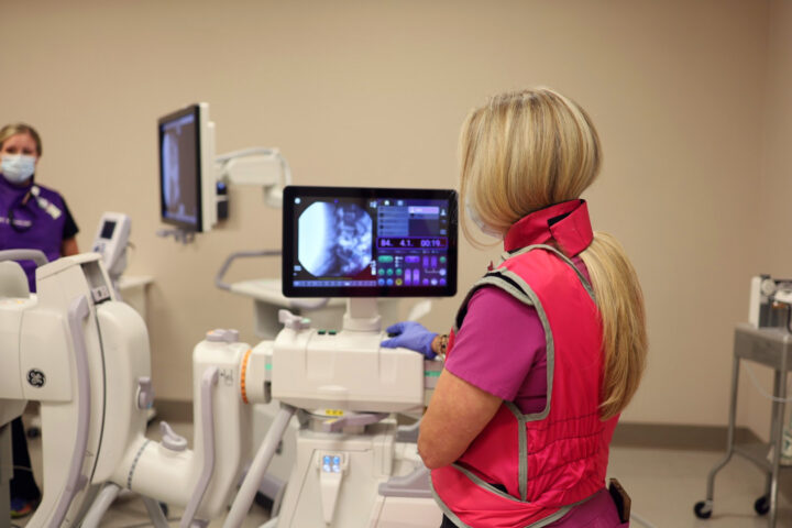 Staff members run an x-ray machine at our Outpatient Hospital Clinic