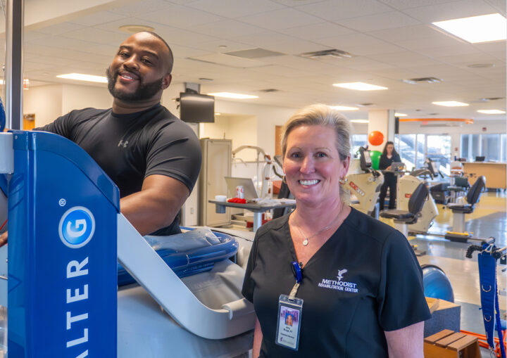 Patient and therapist with the AlterG treadmill